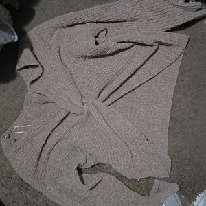 Cute sweater with a back twist opening